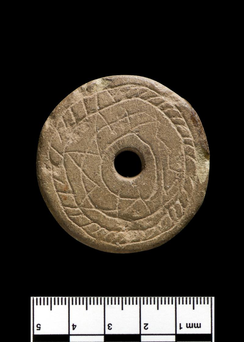 stone spindle whorl (obv)