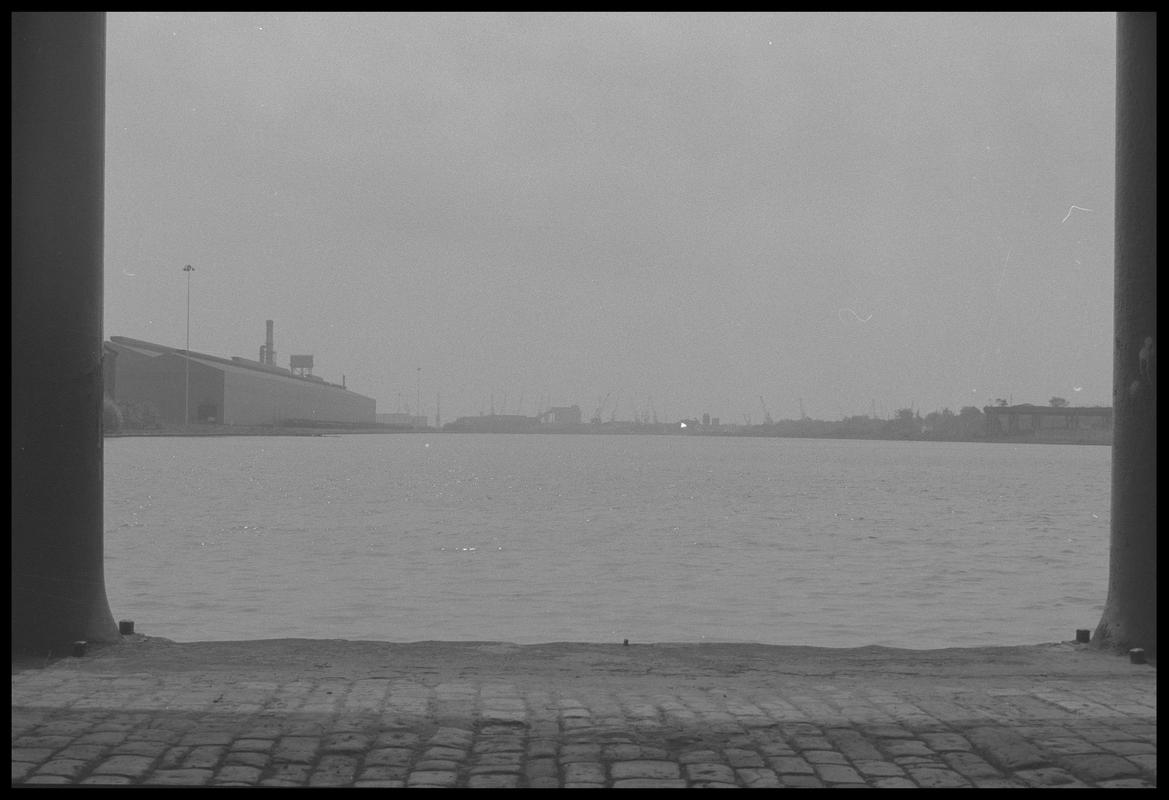 Bute East Dock from between pillars of old warehouse.