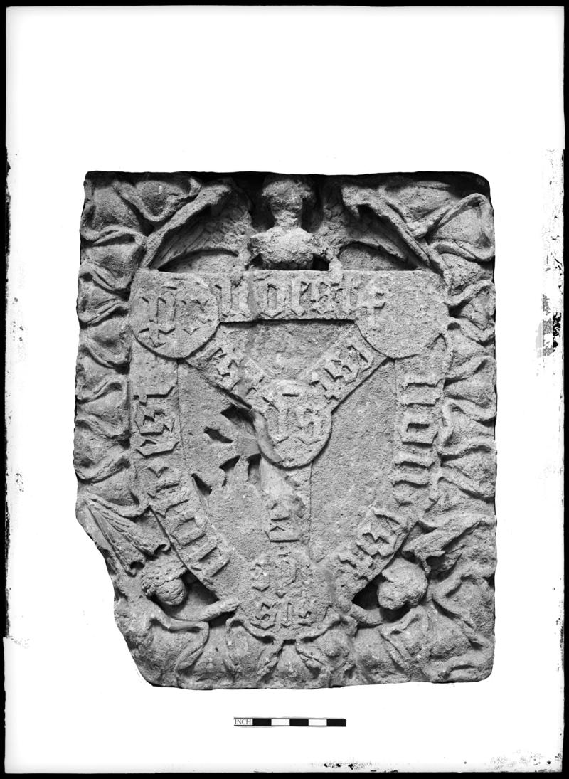 Medieval stone shield carving