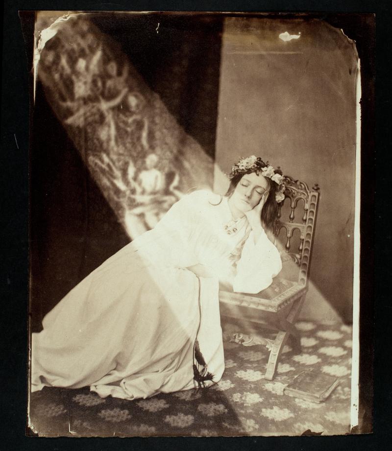 Lady posed in a shaft of light