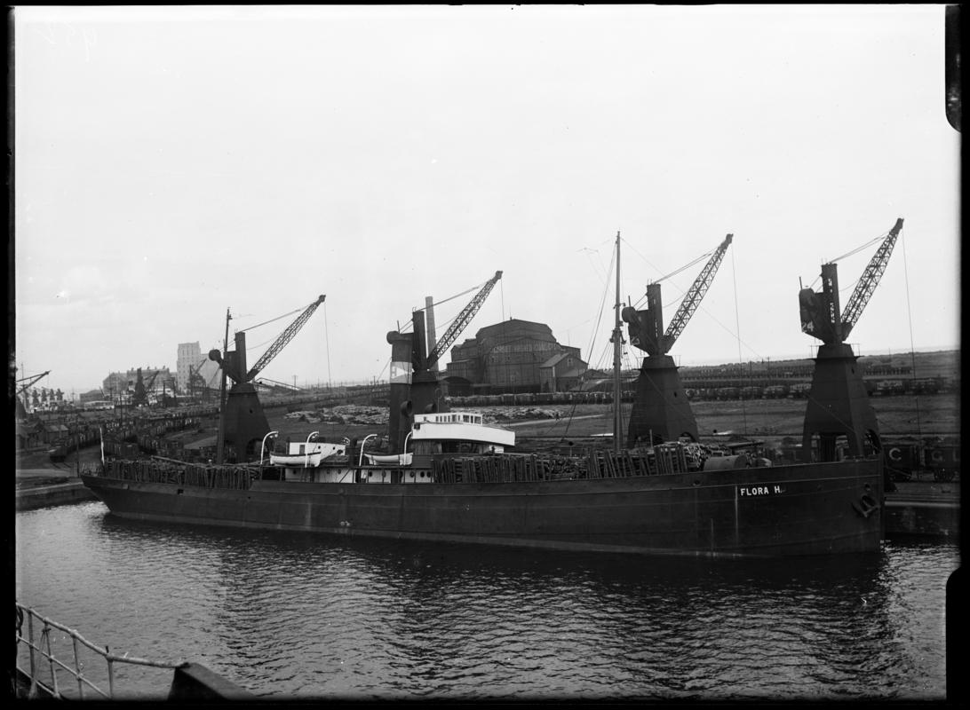 Starboard broadside view of S.S. FLORA H at Cardiff Docks, c.1936.