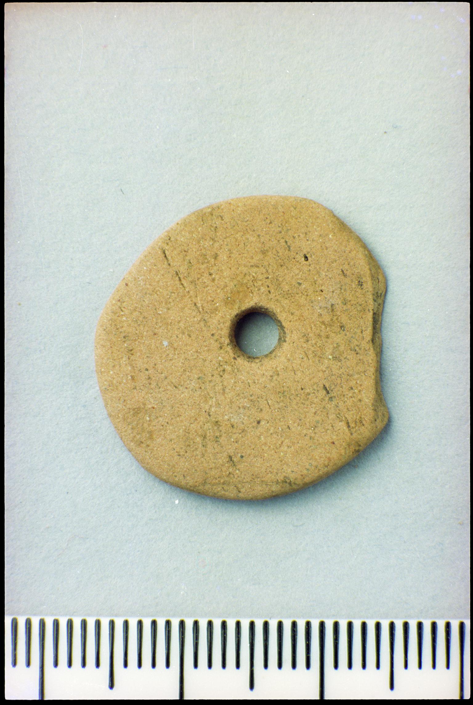 Roman pottery spindle whorl