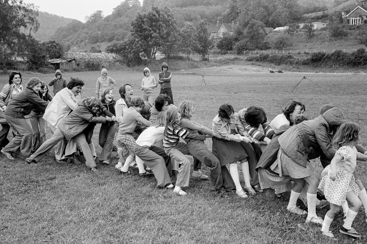 GB. WALES. Tintern. Queens Silver Jubilee Sports day, women&#039;s team for tug-of-war, in the rain. 1977