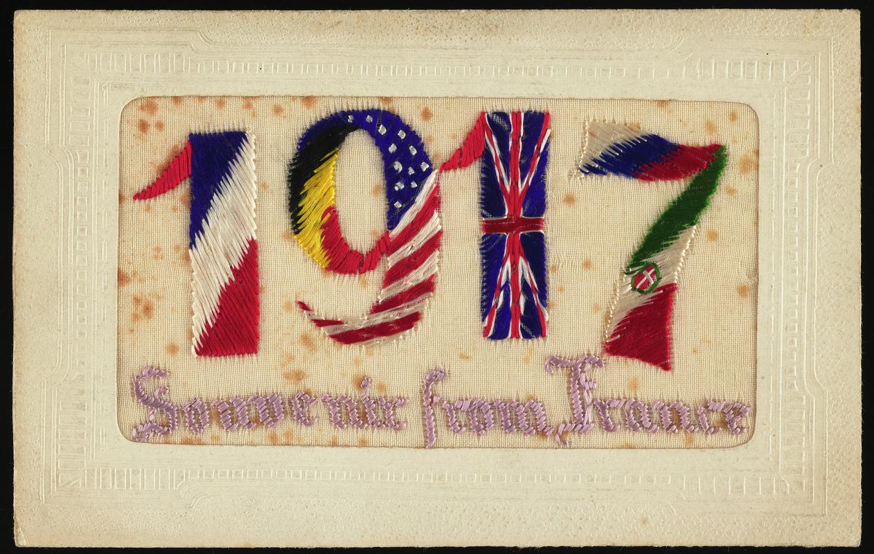 Embroidered postcard inscribed &#039;1917 Souvenir from France&#039;. Handwritten message on back. Dated 17 October 1917. Sent to Miss Evelyn Hussey, sister of Corporal Hector Hussey of the Royal Welch Fusiliers, during the First World War.