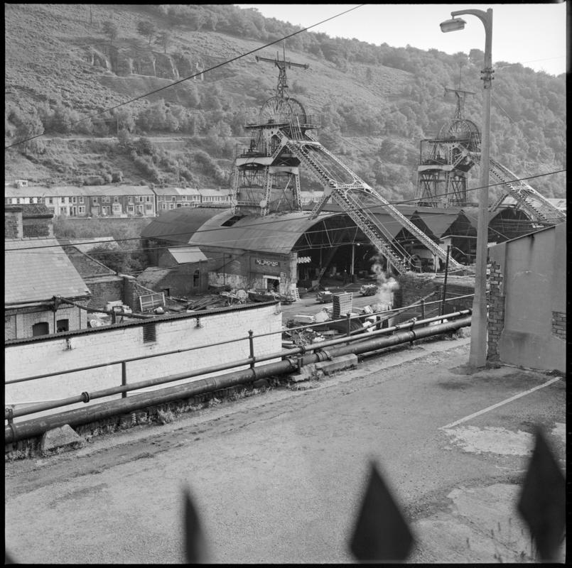 Black and white film negative showing the downcast and upcast headframes, Six Bells Colliery 23 September 1979.  &#039;Six Bells 23 Sept 1975&#039; is transcribed from original negative bag.  Appears to be identical to 2009.3/2915.