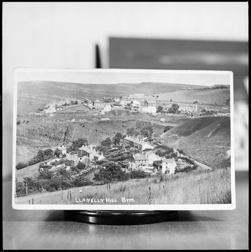 Black and white film negative showing a general view of Llanelly Hill, Abergavenny.  &#039;The Whistle&#039; is transcribed from original negative bag.