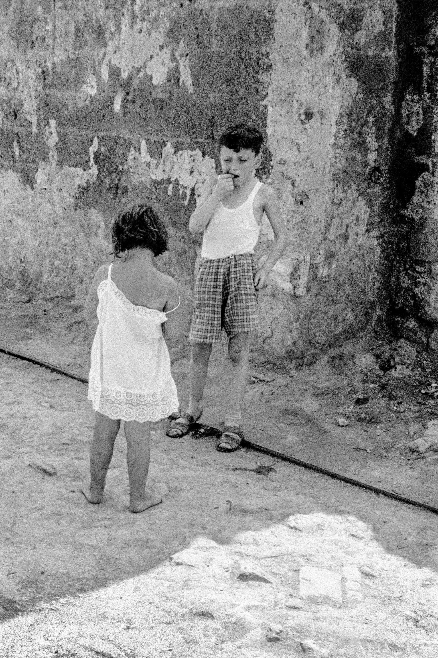 Local children playing. Ischia. Italy