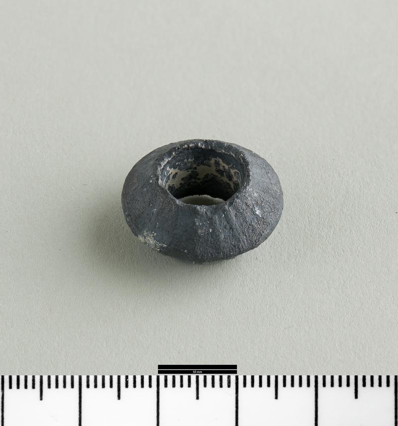 Early Medieval lead spindle whorl