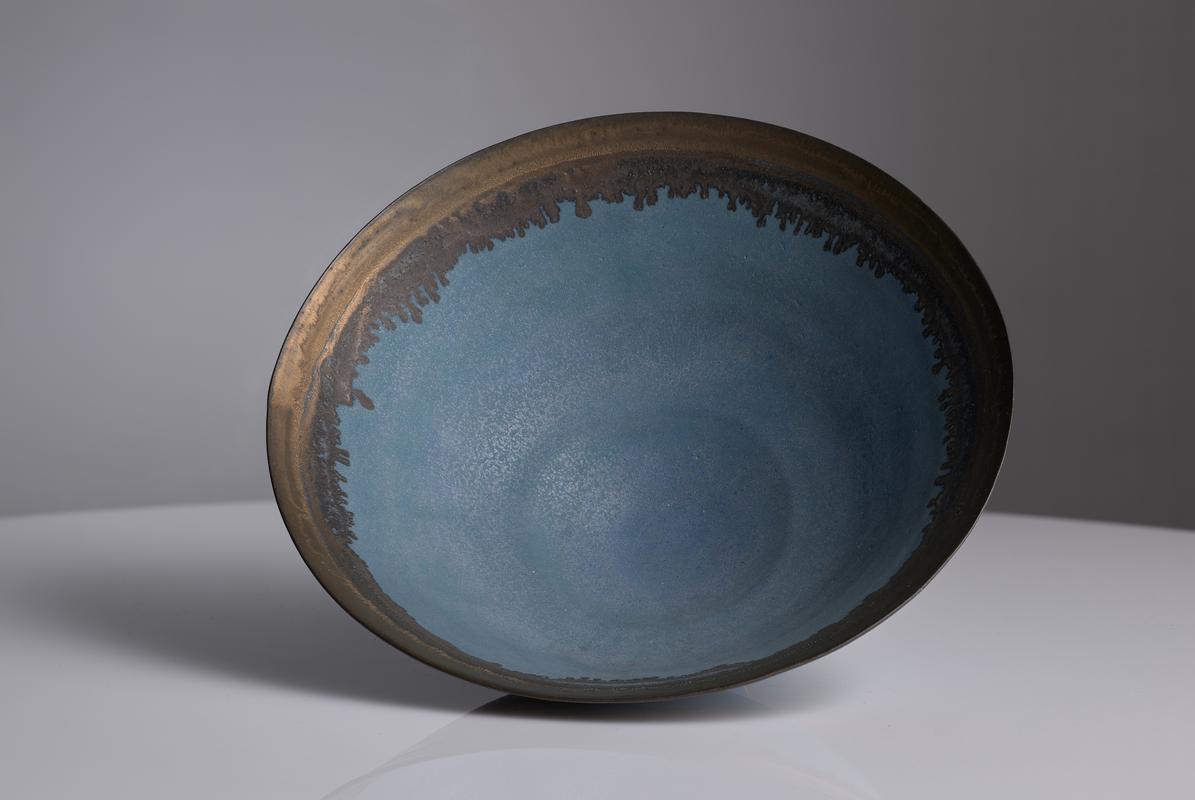 Turquoise bowl with bronze rim