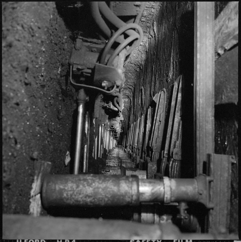 Black and white film negative showing a plough on the coalface? Cwmtillery Colliery 25 November 1977.  &#039;Cwmtillery, 25 November 1977&#039; is transcribed from original negative bag.