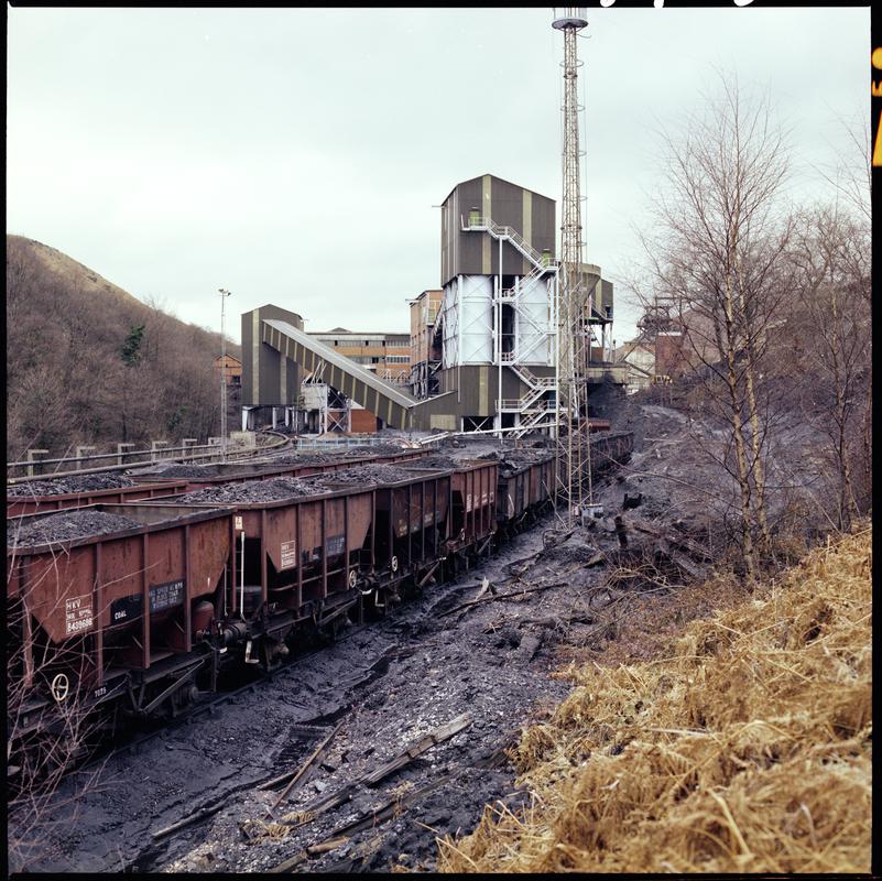 Colour film negative showing a general surface view of Taff Merthyr Colliery, 1970s.  Appears to be identical to 2009.3/1030.