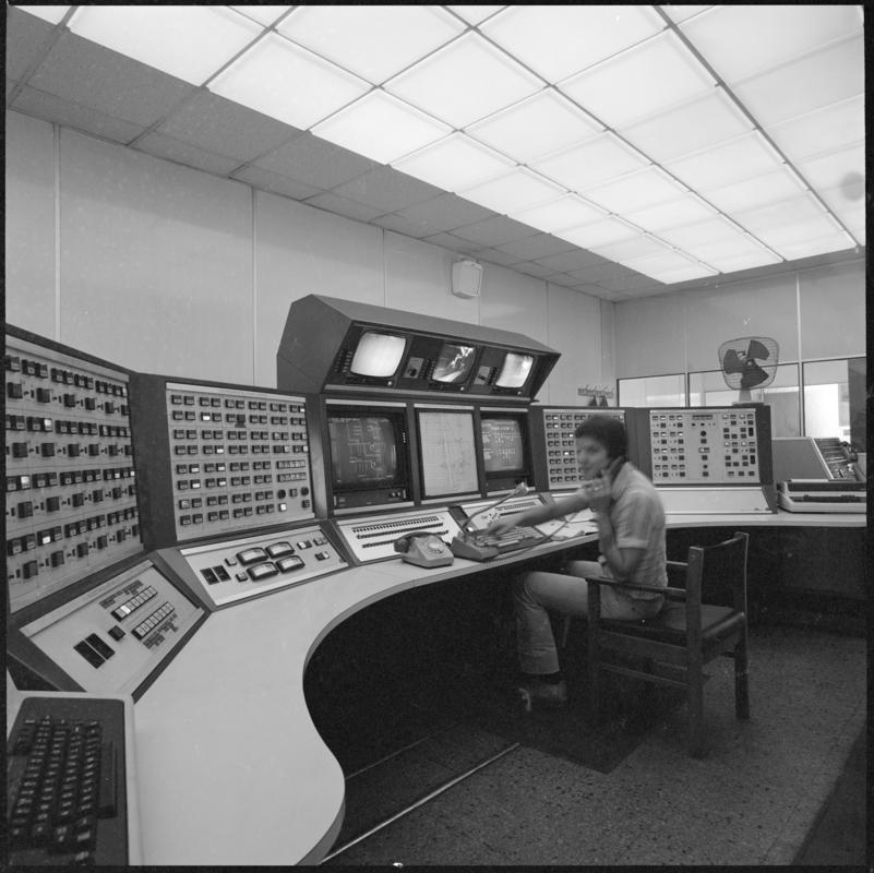 Black and white film negative showing the control room, Betws Mine.