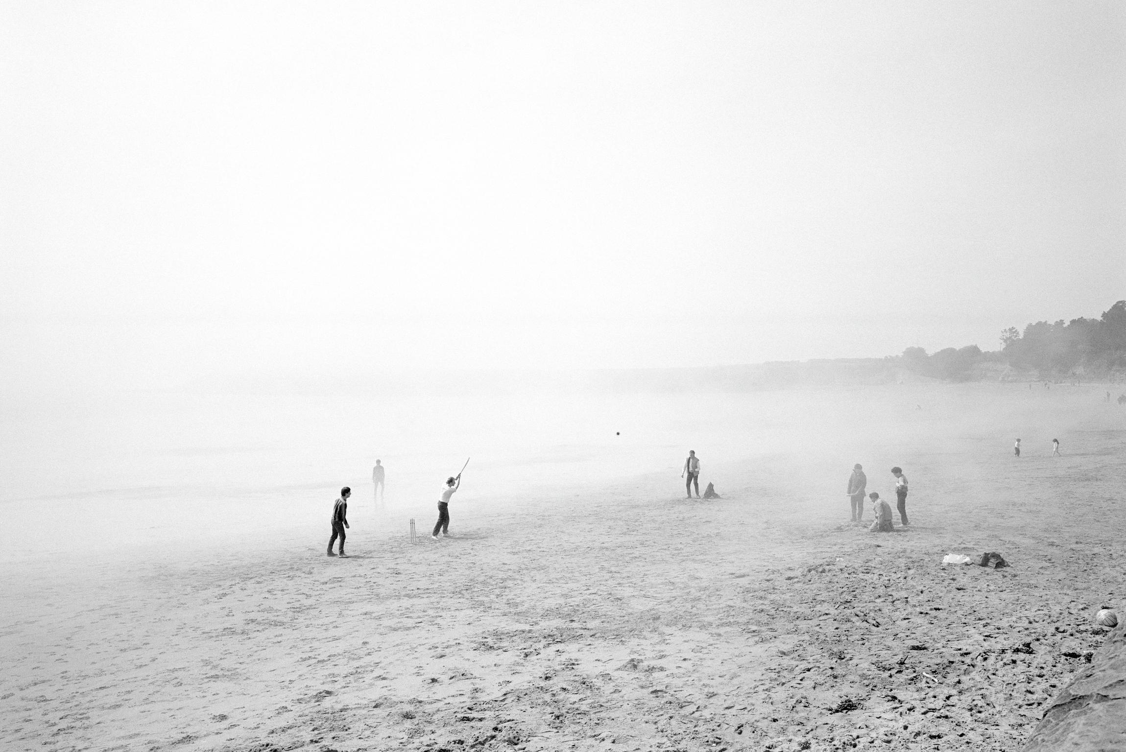 Barry Island beach in the sea mist. Beach cricket. Barry Island, Wales