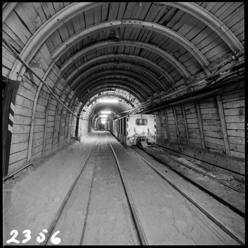 Black and white film negative showing an electric locomotive underground at Merthyr Vale Colliery, 2 July 1981.  &#039;2 Jul 1981&#039; is transcribed from original negative bag.  Appears to be identical to 2009.3/1853.
