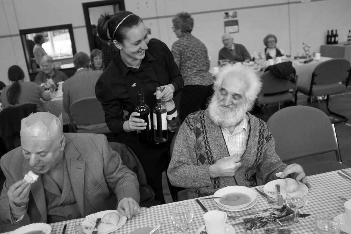 GB. WALES. Tintern. Seniors Christmas lunch in the village hall. 2013