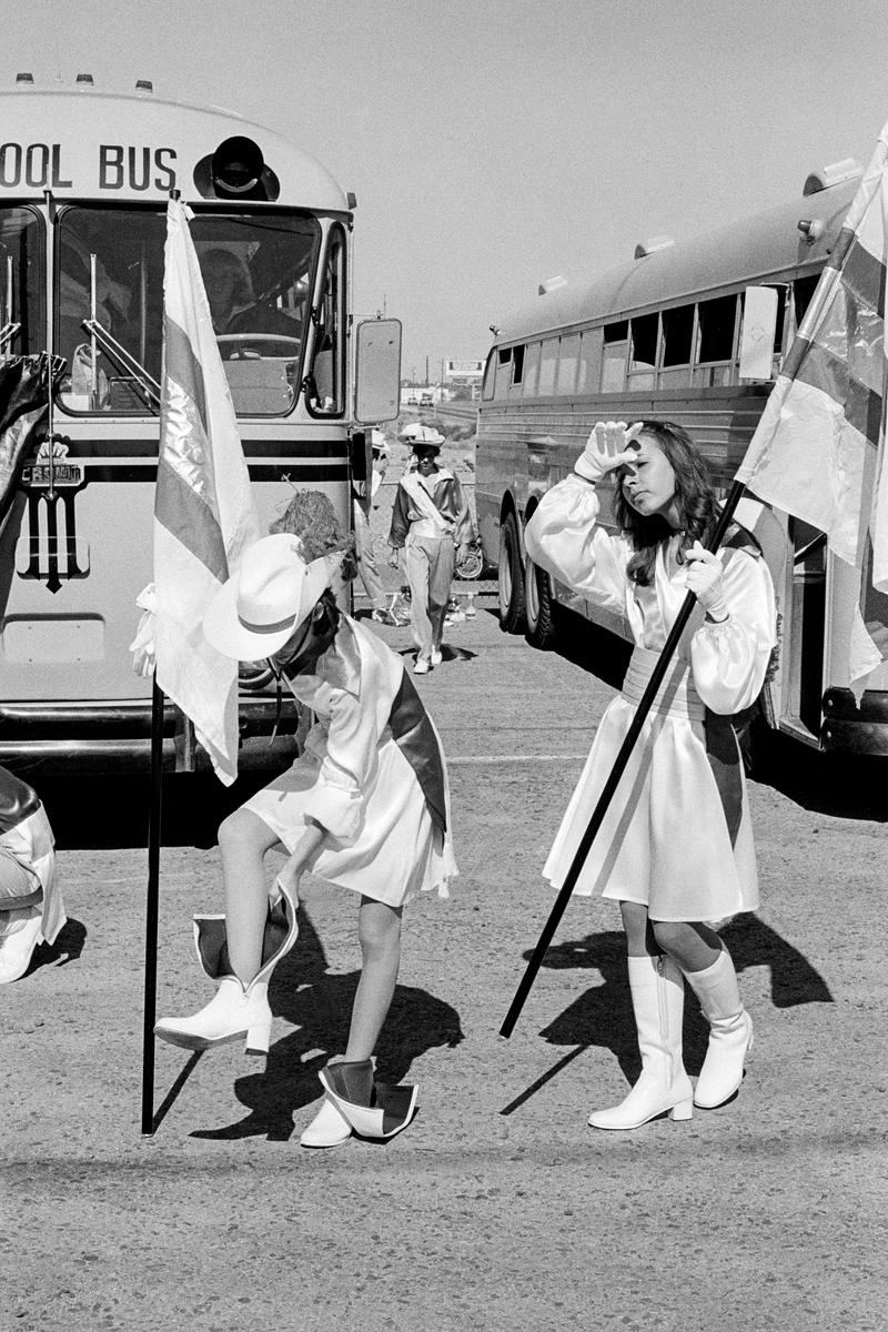 USA. ARIZONA. Tempe. A.S.U. v Utah football game. A high school mass band arrive for performance. 1979.