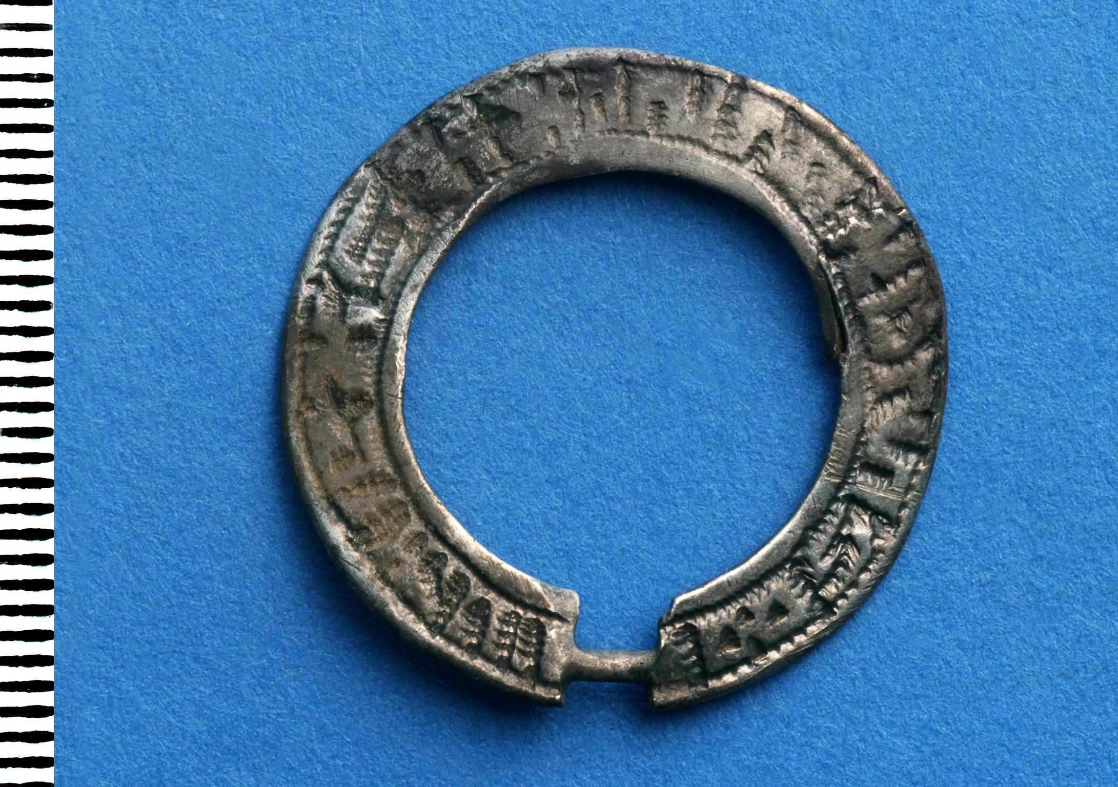 Medieval silver annular brooch