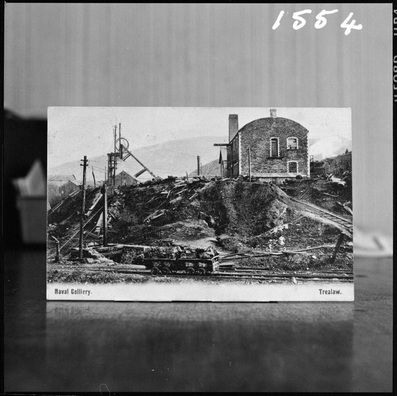 Black and white film negative of a postcard? showing a general surface view of Naval Colliery.  The bottom of the postcard reads &#039;Naval Colliery, Trealaw&#039; .  &#039;Naval&#039; is transcribed from original negative bag.