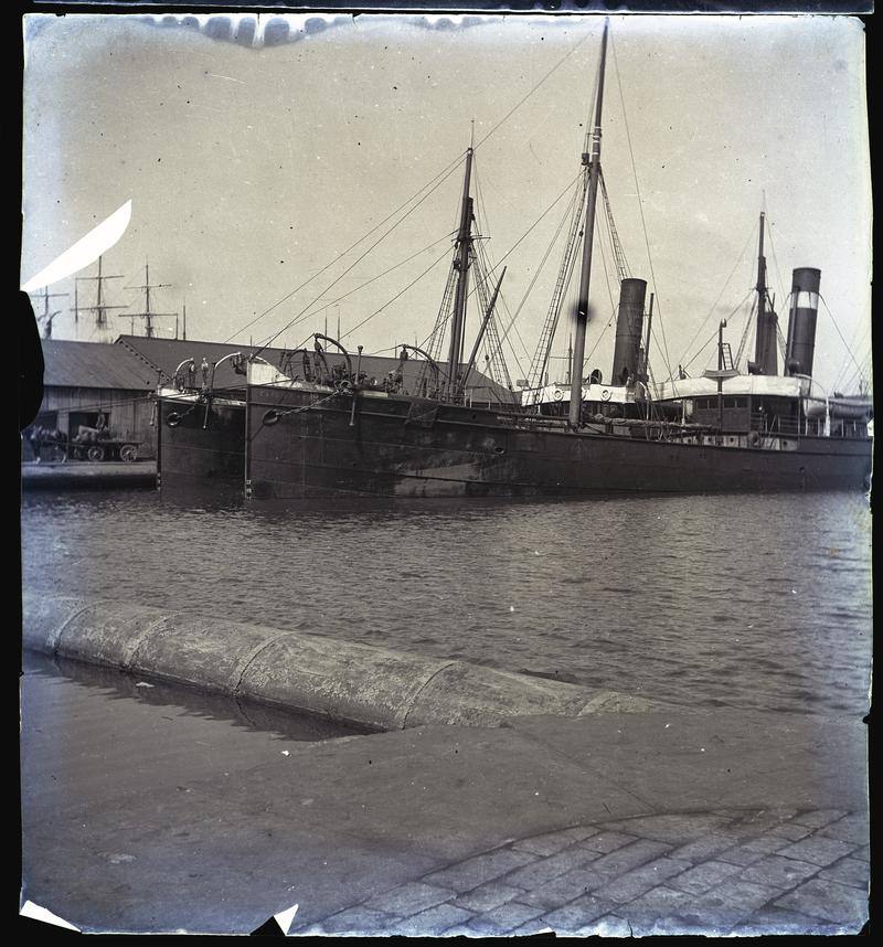 Port view of ss EARL OF ROSEBERRY, built 1880 for Martin &amp; Marquand of Cardiff, with an unidentified tramp steamer in the Bute East Basin, Cardiff.