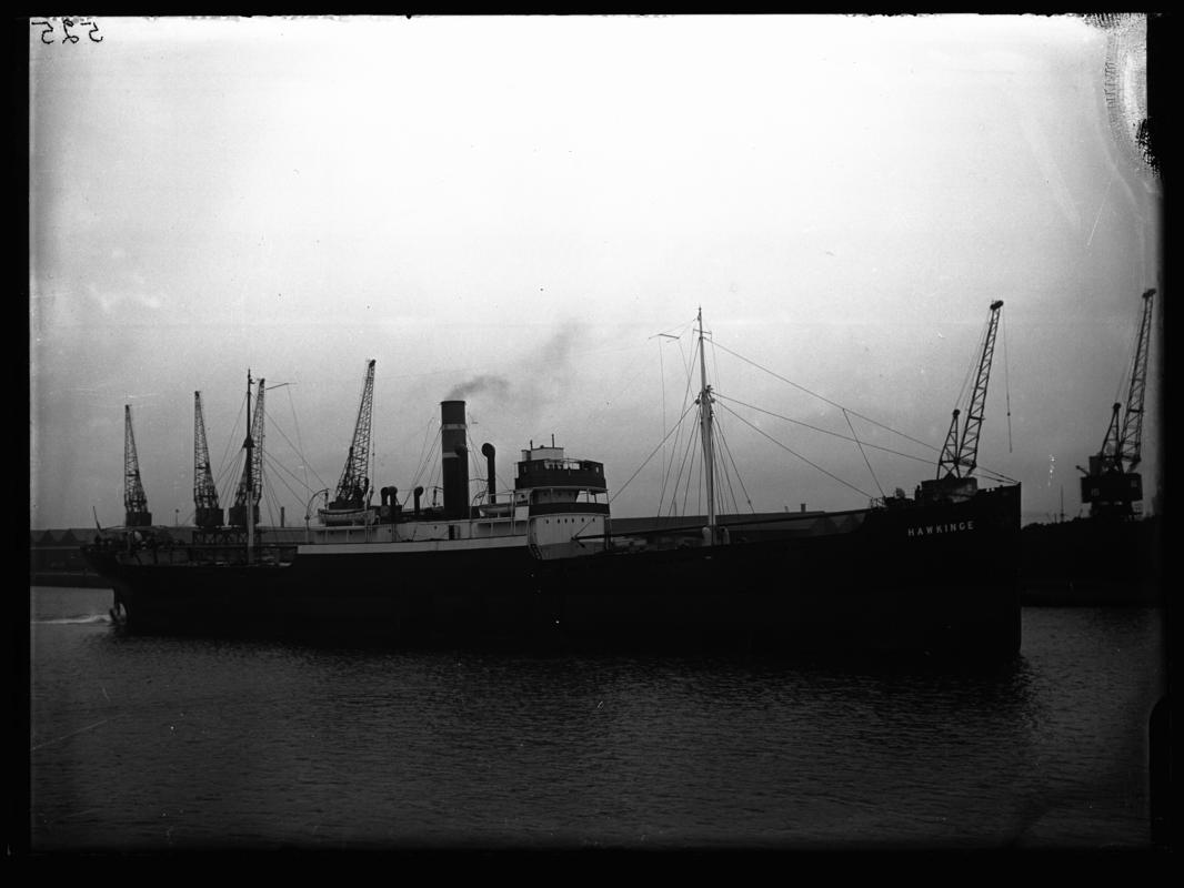Starboard broadside view of S.S. HAWKINGE at Cardiff Docks, c.1936.