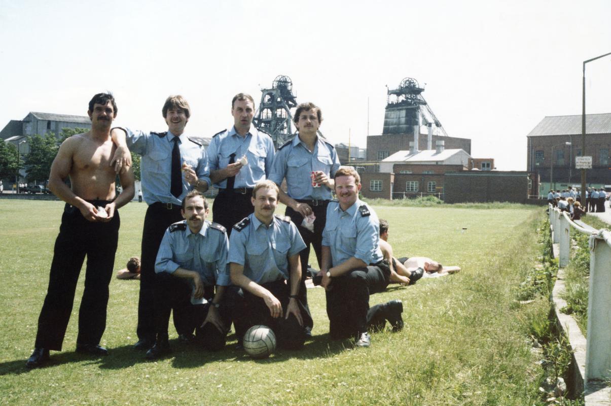 Police officers (H2 PSU Police Support Unit, Swansea Division of South Wales Police) at Creswell Colliery, Derbyshire after a football match during the miners&#039; strike