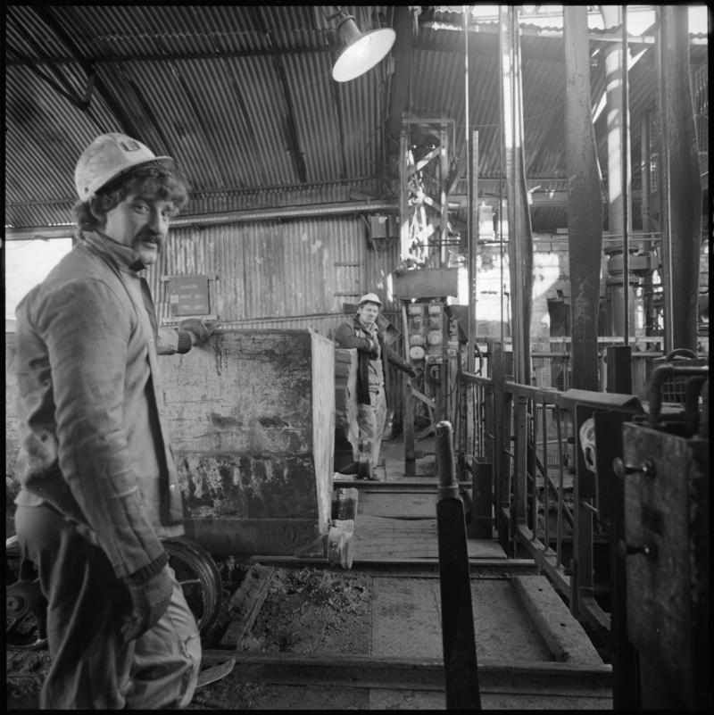 Black and white film negative showing a ?Banksman at pit top, St John&#039;s Colliery.