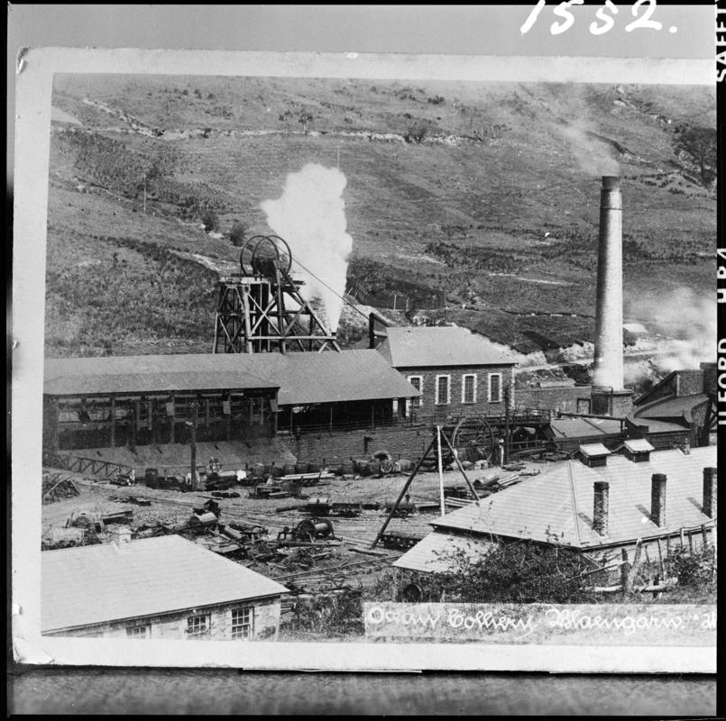 Black and white film negative of a photograph? showing a general surface view of Ocean Colliery.  The bottom of the photograph reads &#039;Ocean Colliery, Blaengarw&#039;.   &#039;Garw&#039; is transcribed from original negative bag.