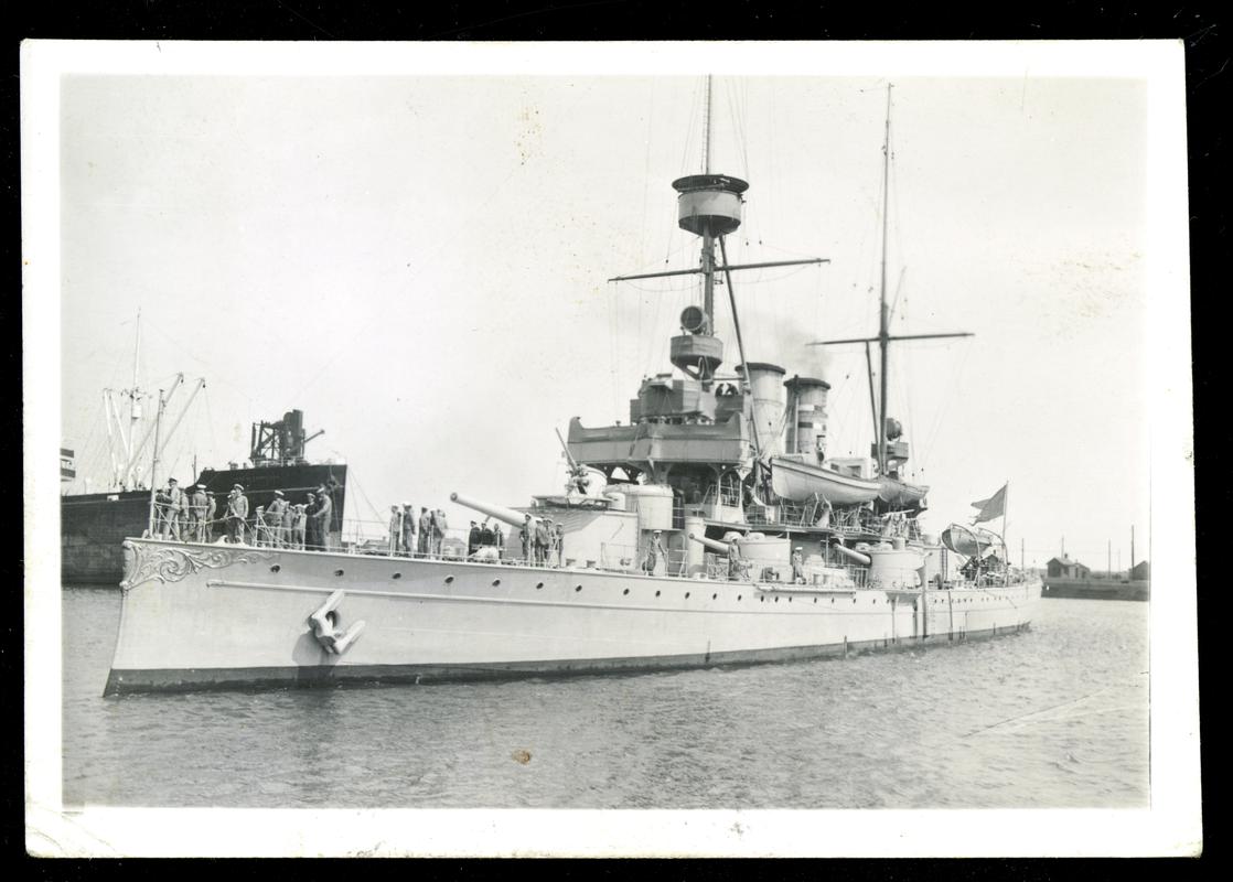 Full port bows view of the Swedish cruiser FYLGIA docking at Queen Alexandra Dock, Cardiff, pre-1923.