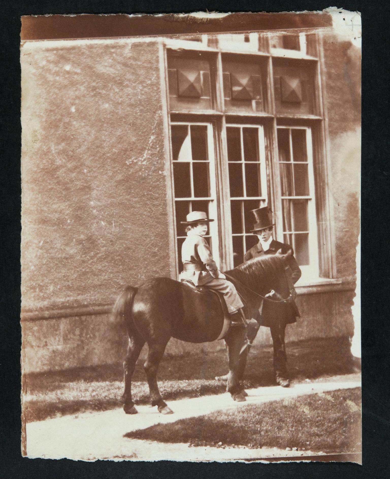 Boy on pony, photograph