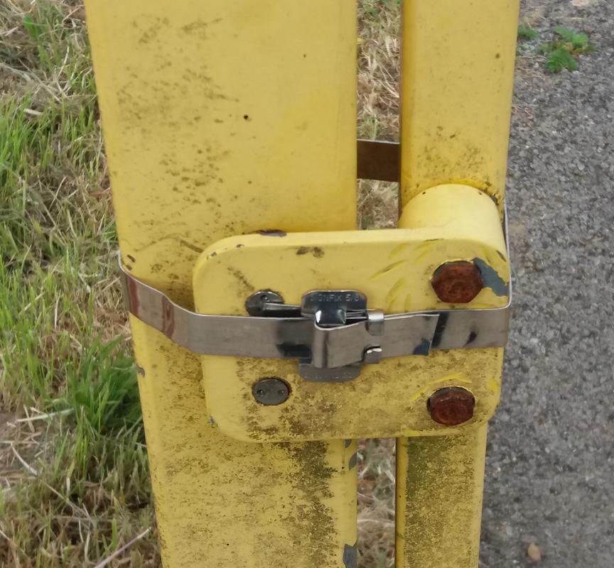 Metal strip used to lock the playpark gate in Coytrahen, Bridgend, during lockdown.