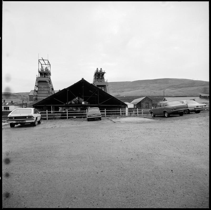Black and white film negative showing a view of Coegnant Colliery taken from the car park,  25 November 1981.  &#039;25 Nov 1981&#039; is transcribed from original negative bag.