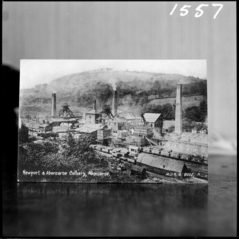 Black and white film negative of a postcard? showing a general surface view of Celynen South Colliery.  Bottom of postcard reads &#039;Newport &amp; Abercarne Colliery, Abercarne&#039;.    &#039;South Celynen&#039; is transcribed from original negative bag.
