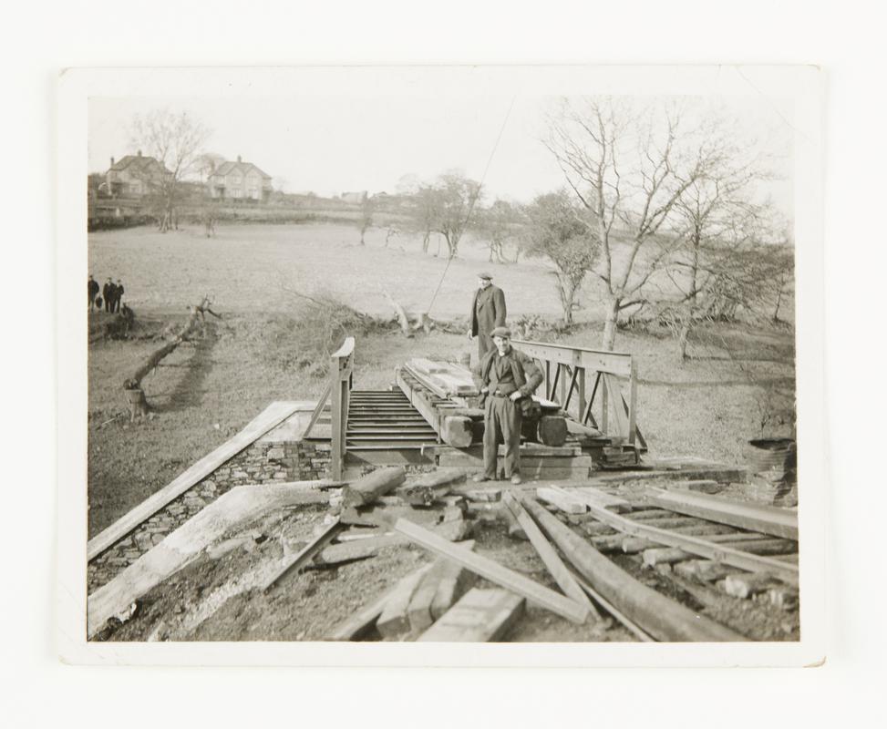 Photograph showing Stan Williams and John Evans building a bridge at Oakdale.