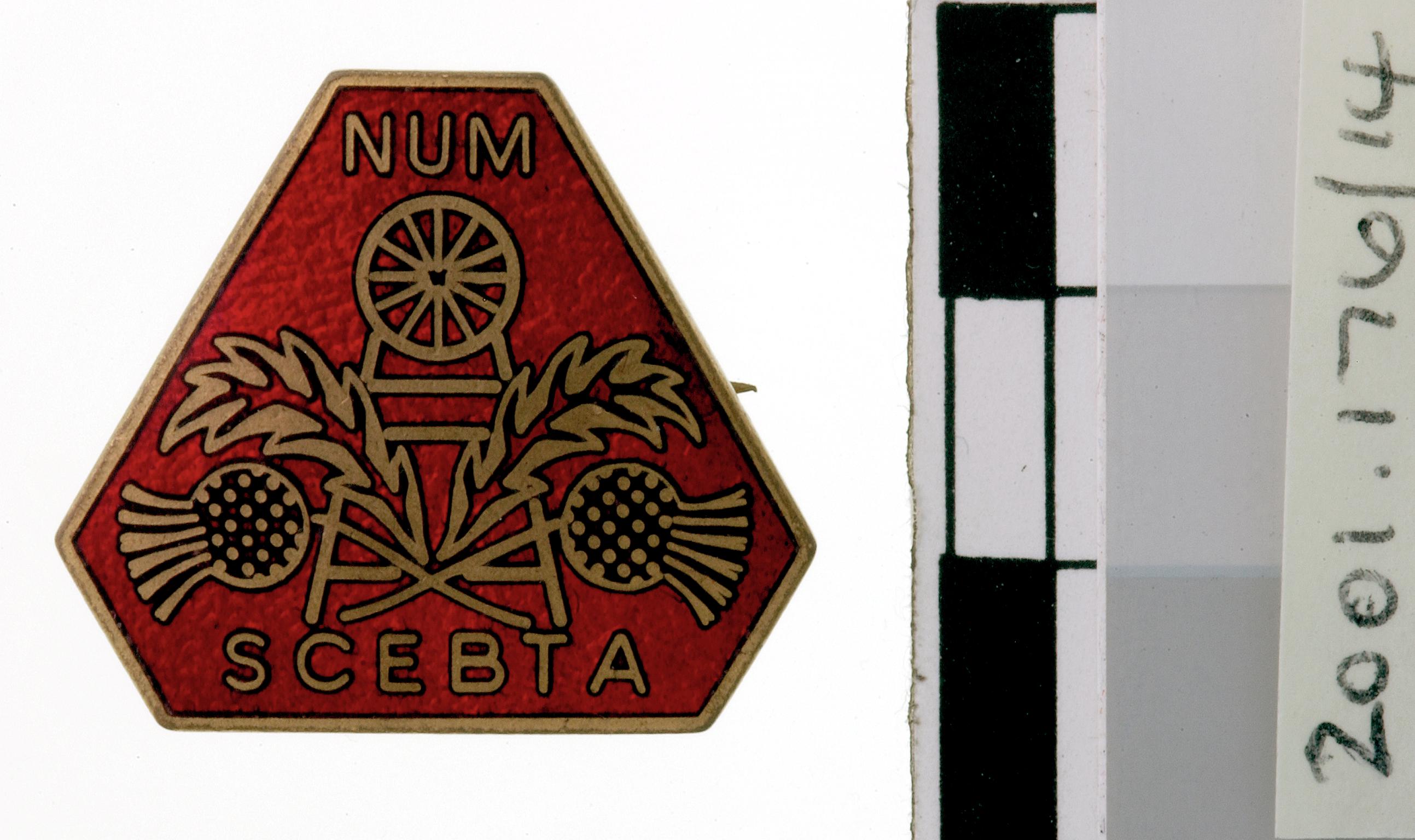 N.U.M. S.C.E.B.T.A., badge