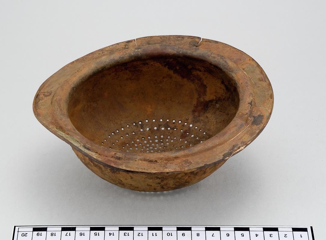 Iron Age copper alloy strainer