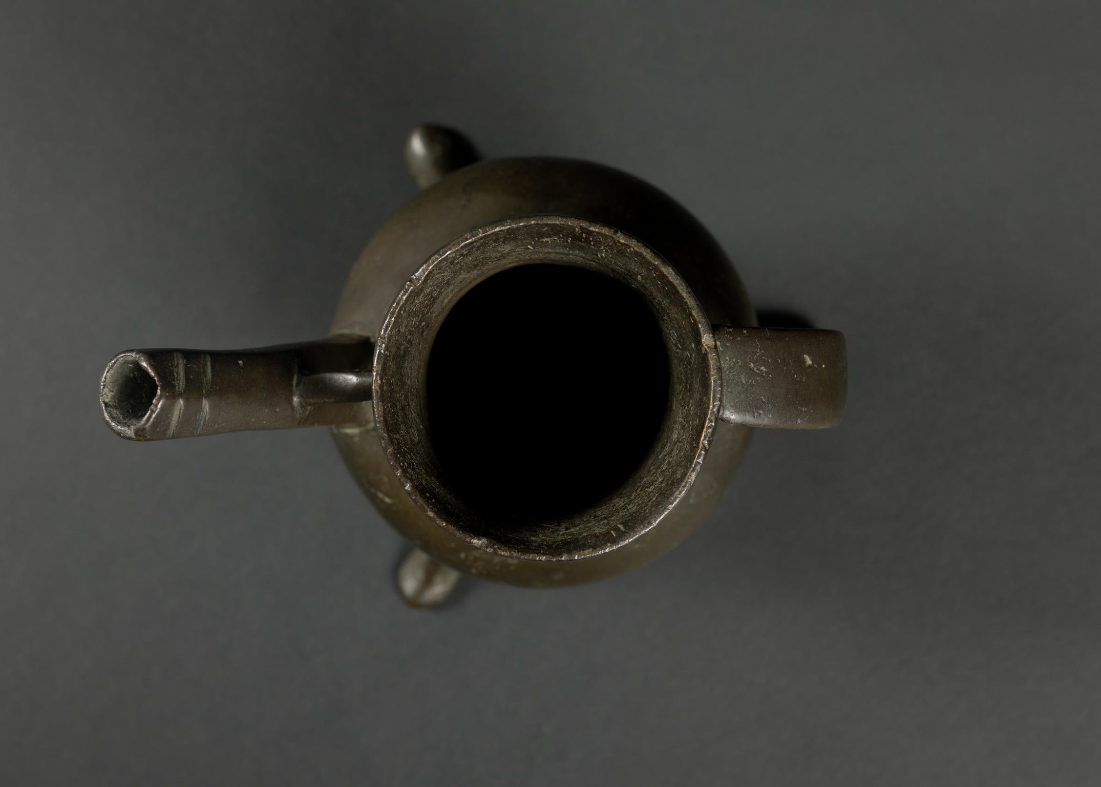 Medieval copper alloy tripod ewer