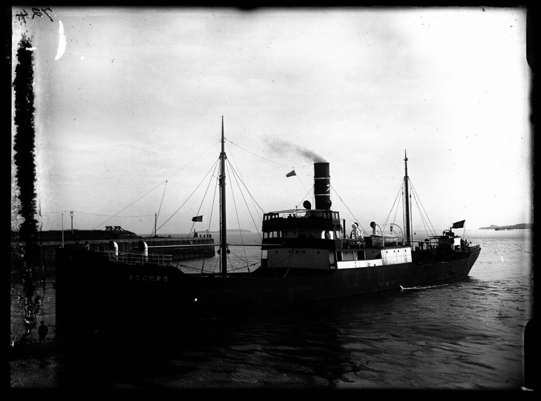 3/4 Port bow view of S.S. ASGERD and waterman&#039;s boat entering Cardiff Docks, c.1936