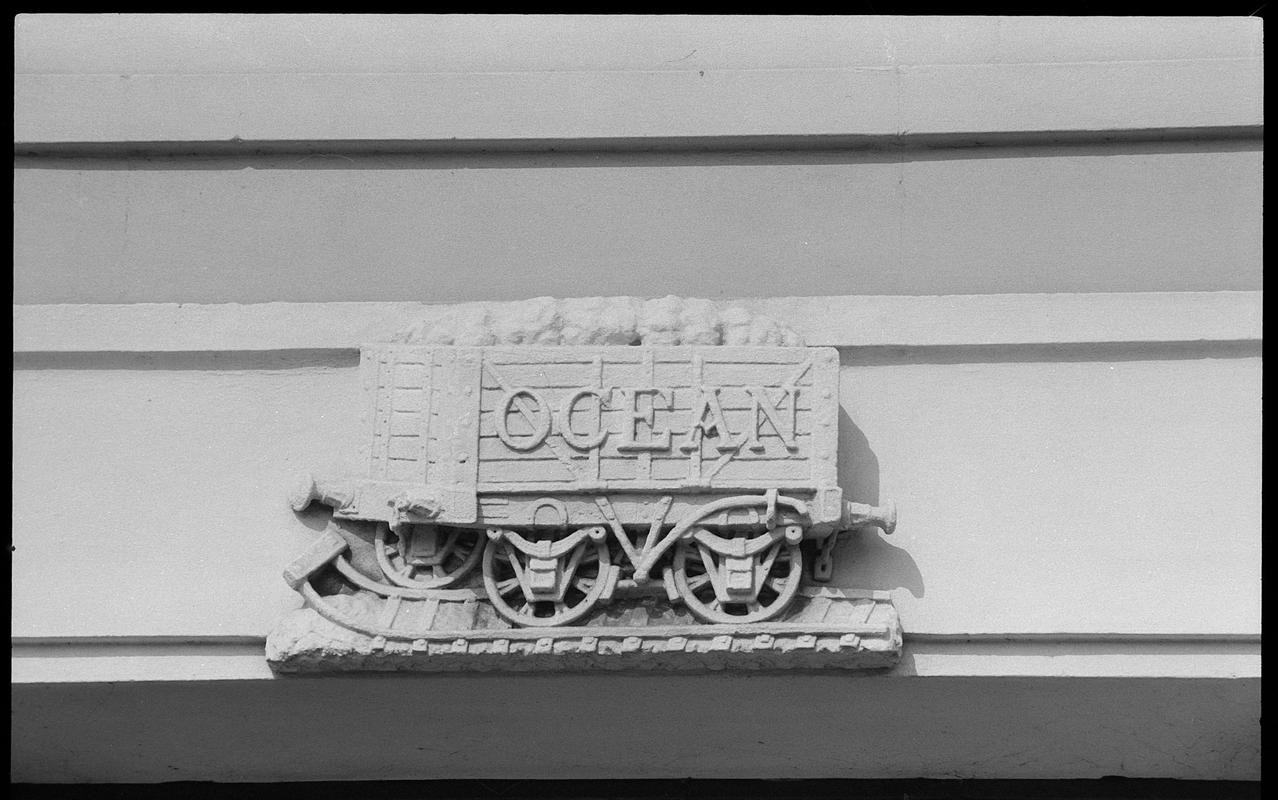 Coal wagon frieze, bearing the name &quot;Ocean&quot; (depicted in stone), on Ocean Buildings, Butetown.