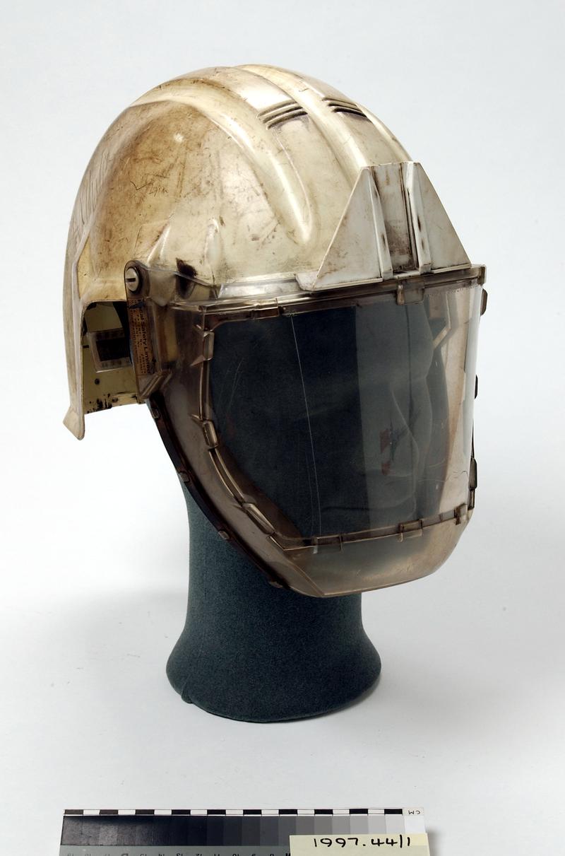 White Type A.H.6. N.C.B. airstream safety helmet with eye visor shield.