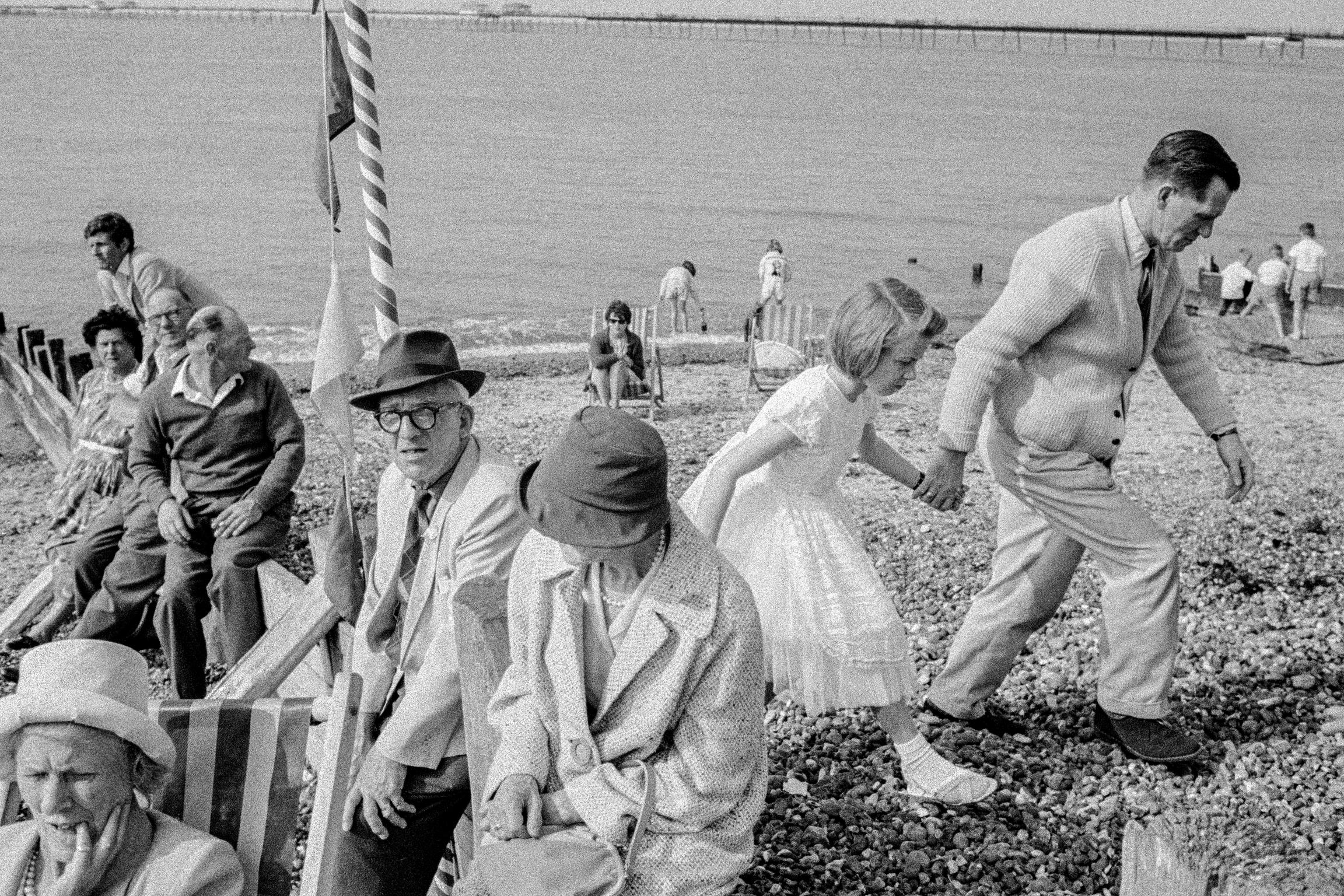 Families on the beach of the working class holiday resort. Herne Bay, UK