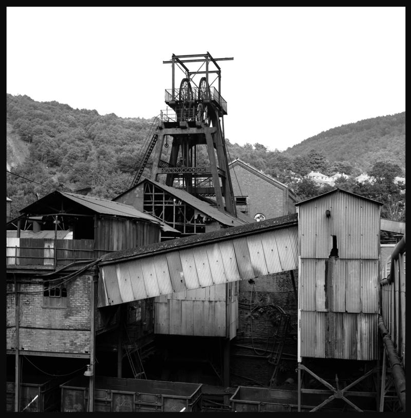 Black and white film negative showing a surface view of Celynen South Colliery, 1978.  The headframe was built by E.Finch &amp; Co of Chepstow.