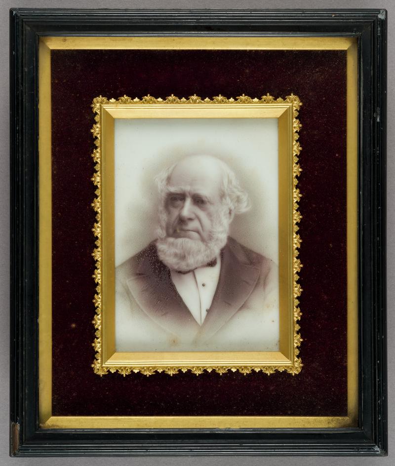 Framed portrait on porecelain of Henry Richard MP (1812-1888).