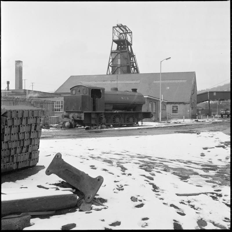 Black and white film negative showing a NCB steam locomotive in the Lady Windsor Colliery yard with the upcast shaft in the background.  &#039;Lady Windsor&#039; is transcribed from original negative bag.