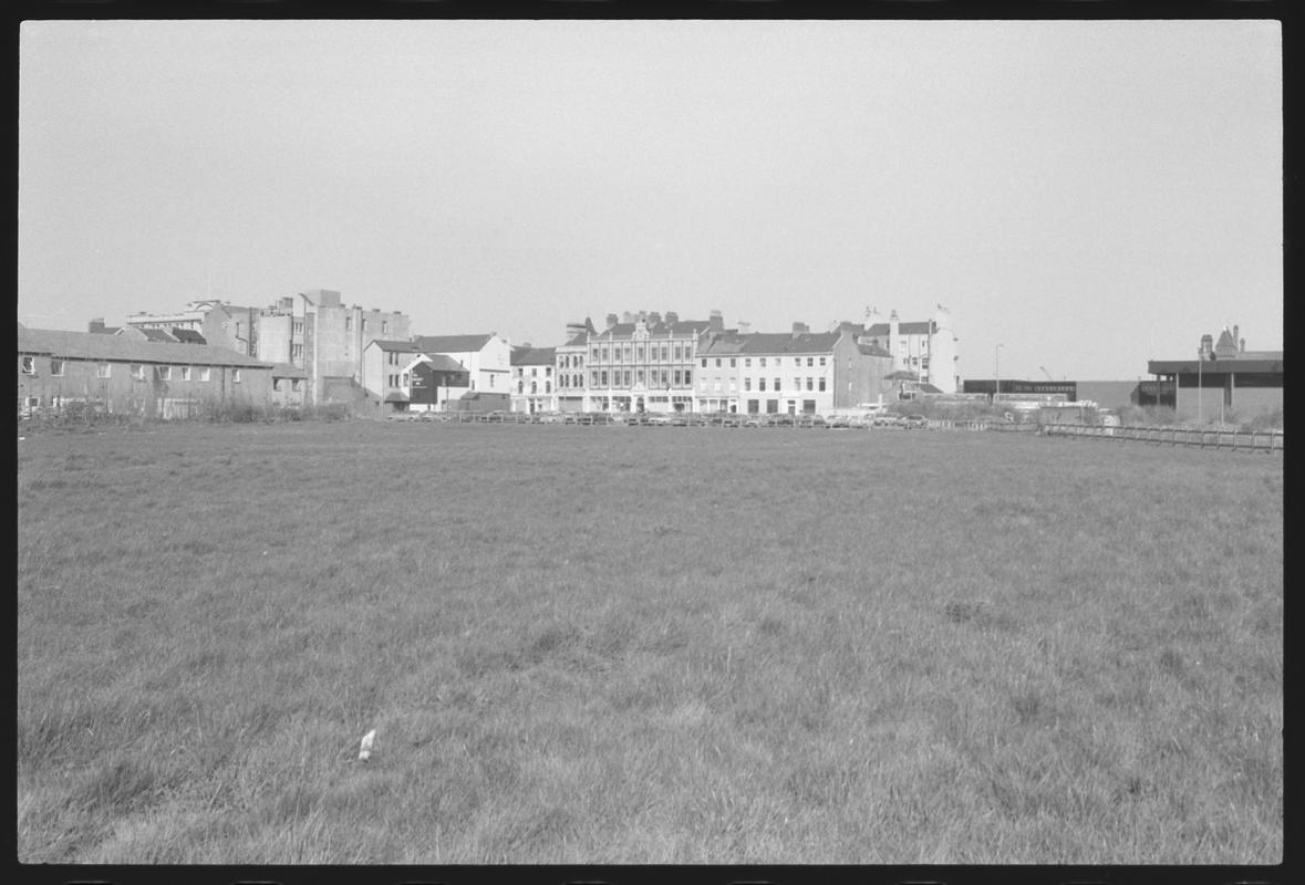 View across waste ground to Bute Street and the Welsh Industrial and Maritime Museum building. Site of proposed new road.