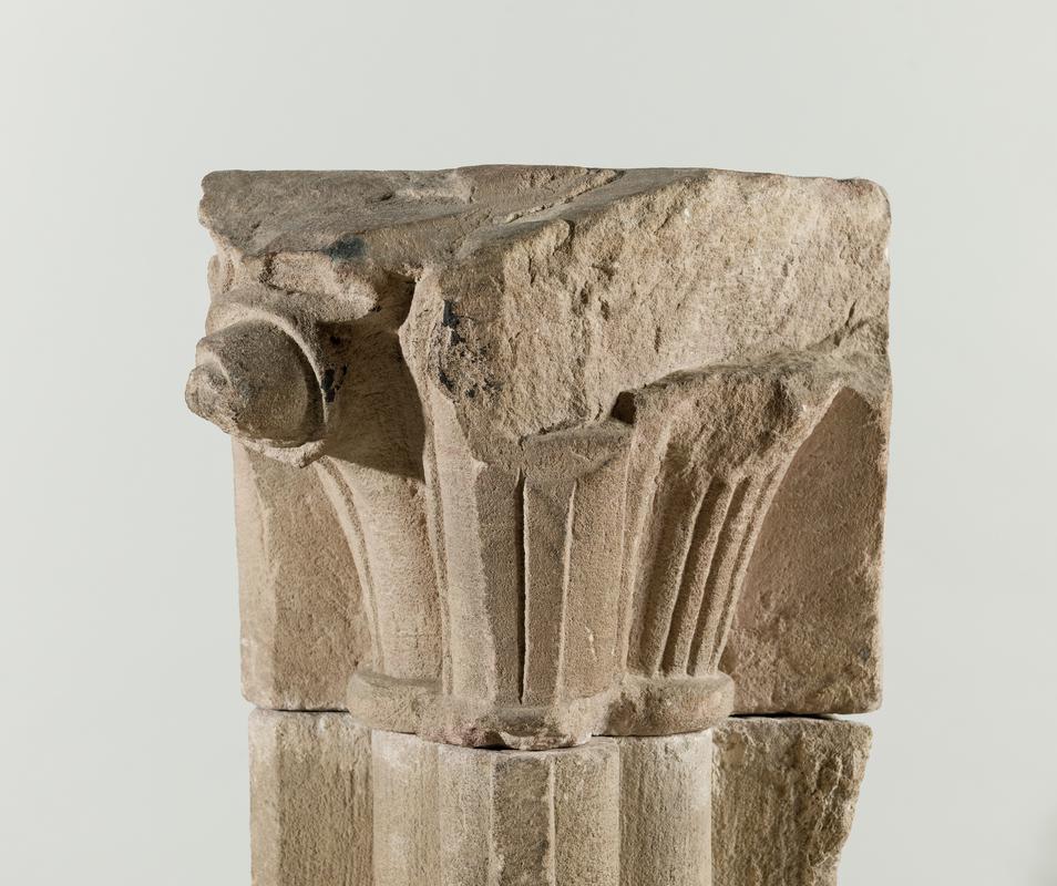 Medieval stone corbel - Capital from a column only, decorated with a foliage motif. The fragments in the two record entries preceding this one form part of the same column.