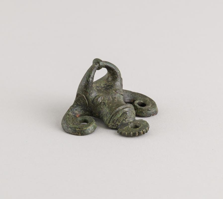 Roman copper alloy ox head escutcheon