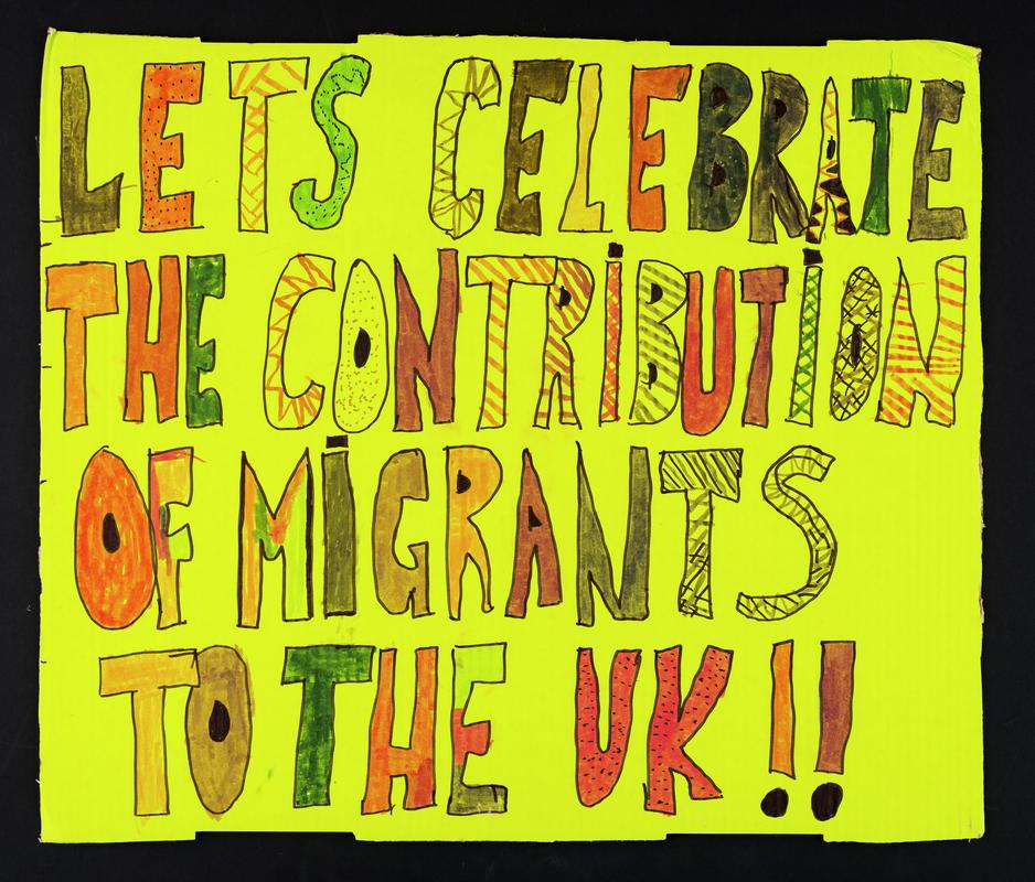 &#039;Lets Celebrate the Contribution of Migrants to the UK!!&#039; placard used at the One Day Without Us migrants rally outside the Senedd on 17 February 2018.