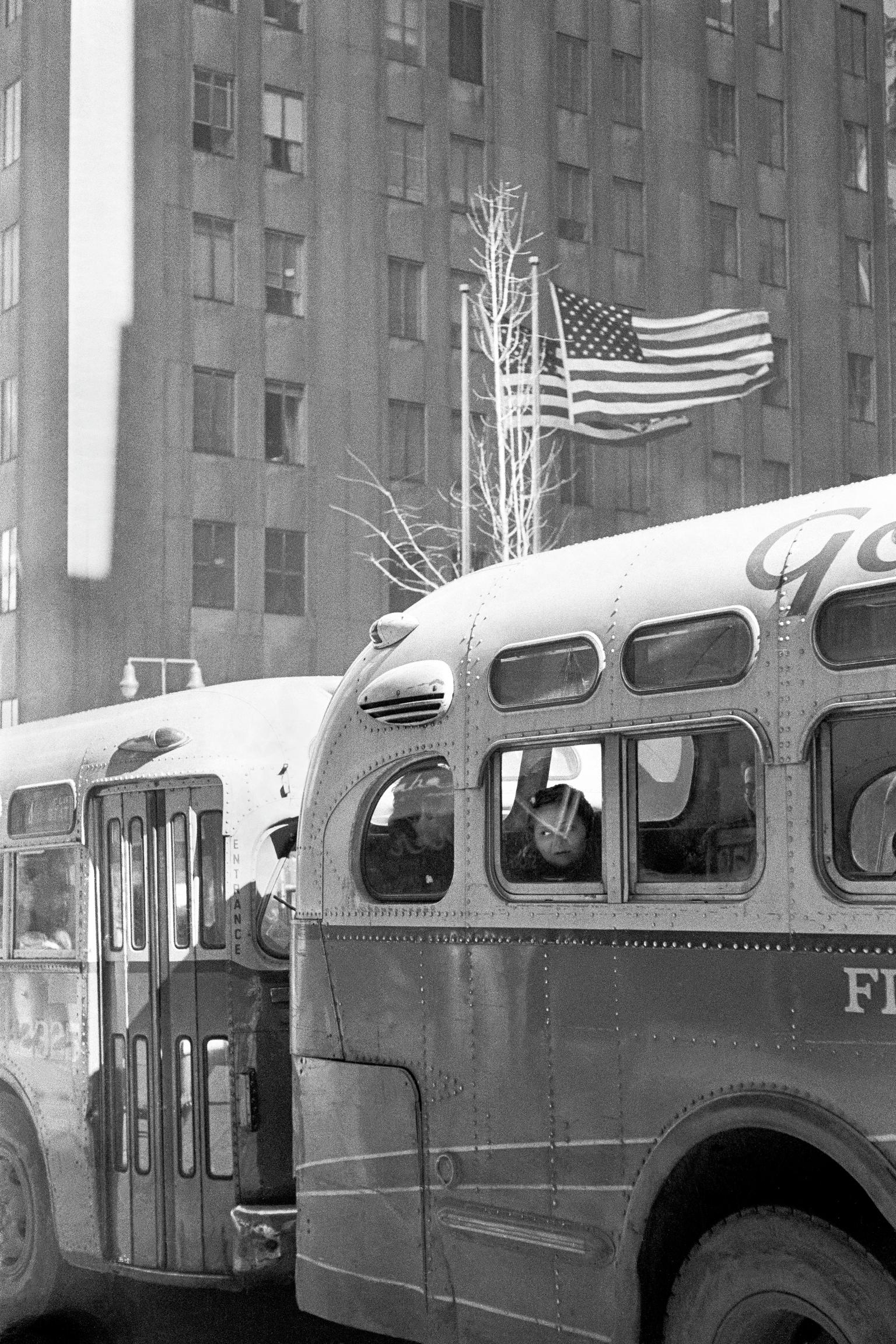 Bus plus the American flag. Lower Manhattan, New York USA