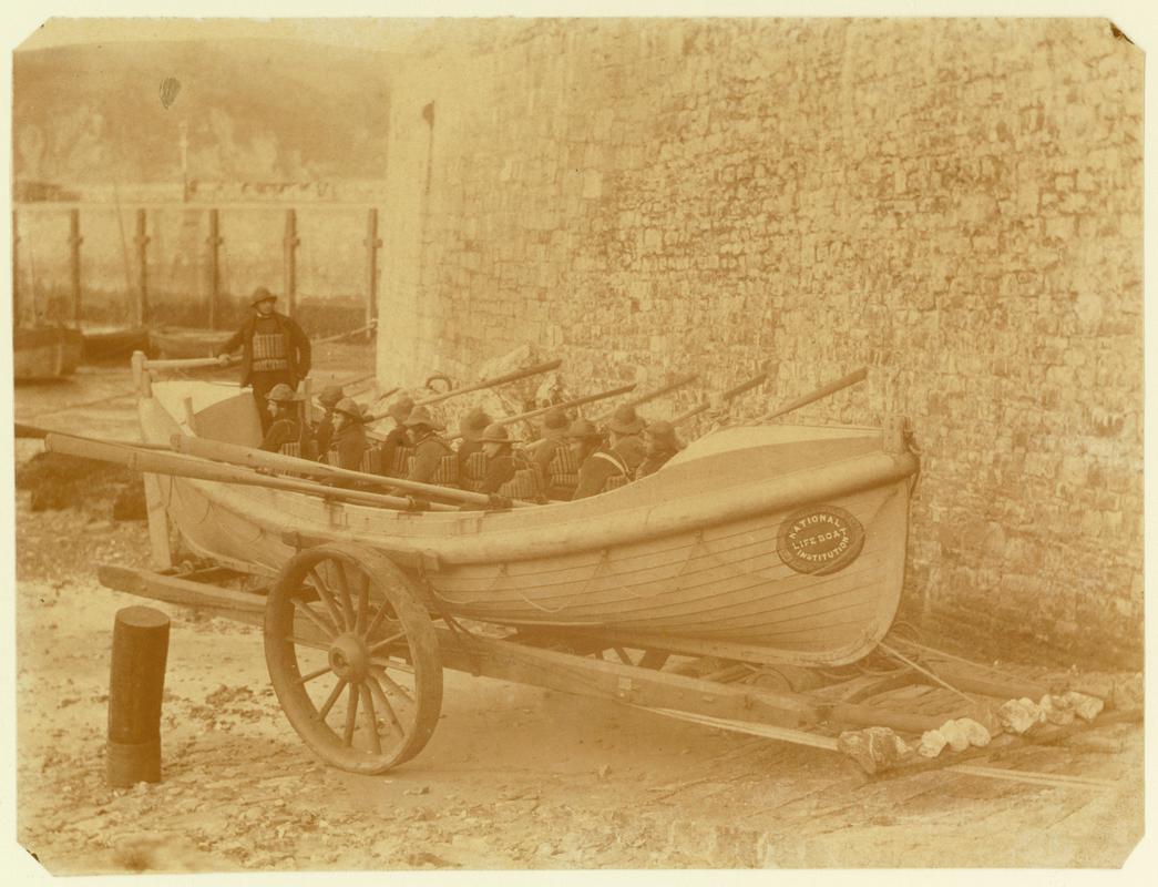 pulling lifeboat on carriage, photograph