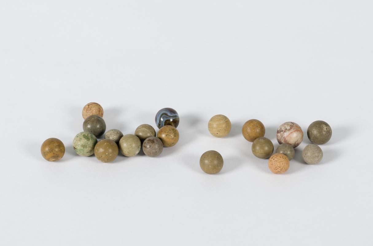 Stone, pottery and glass marbles